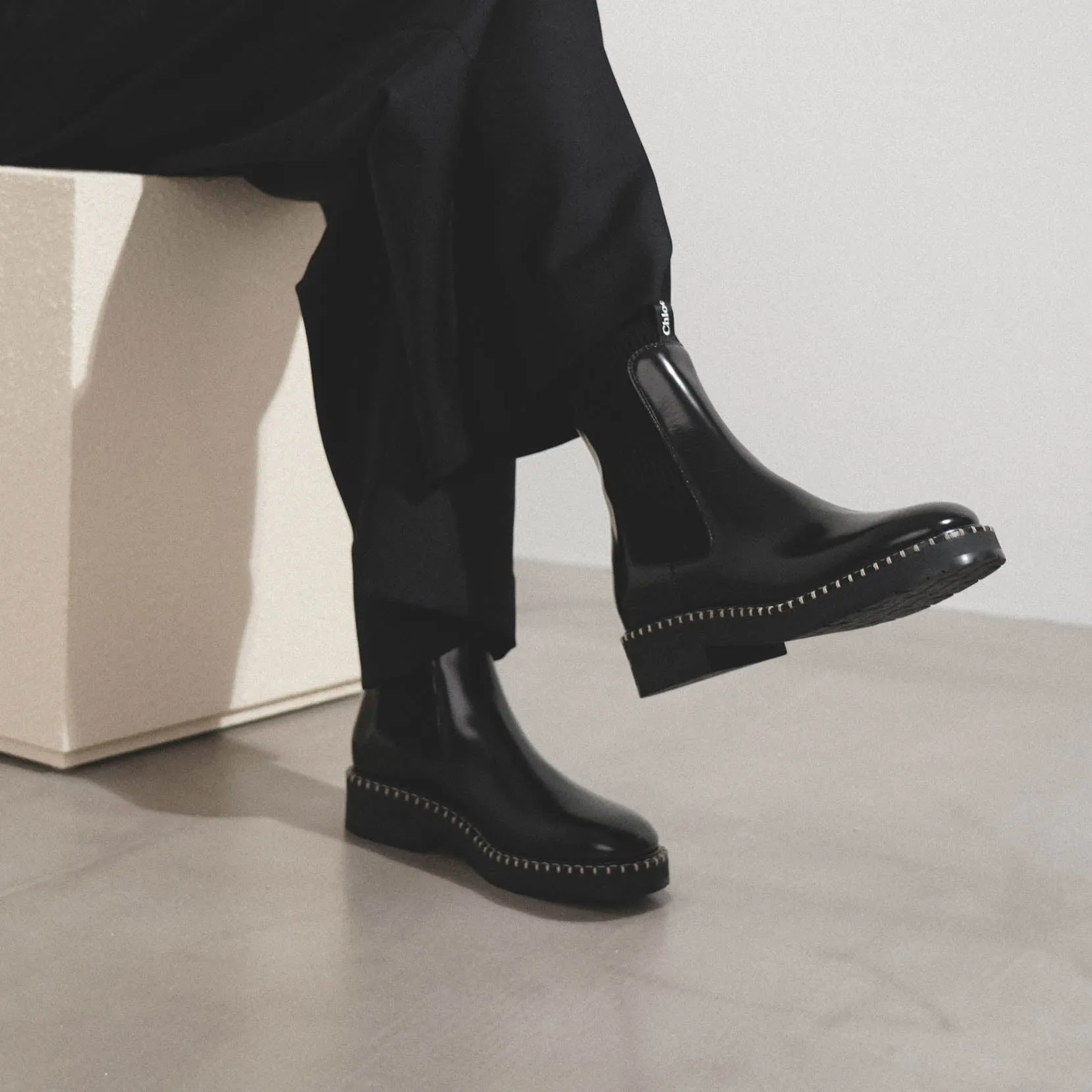 Noua black leather ankle boots