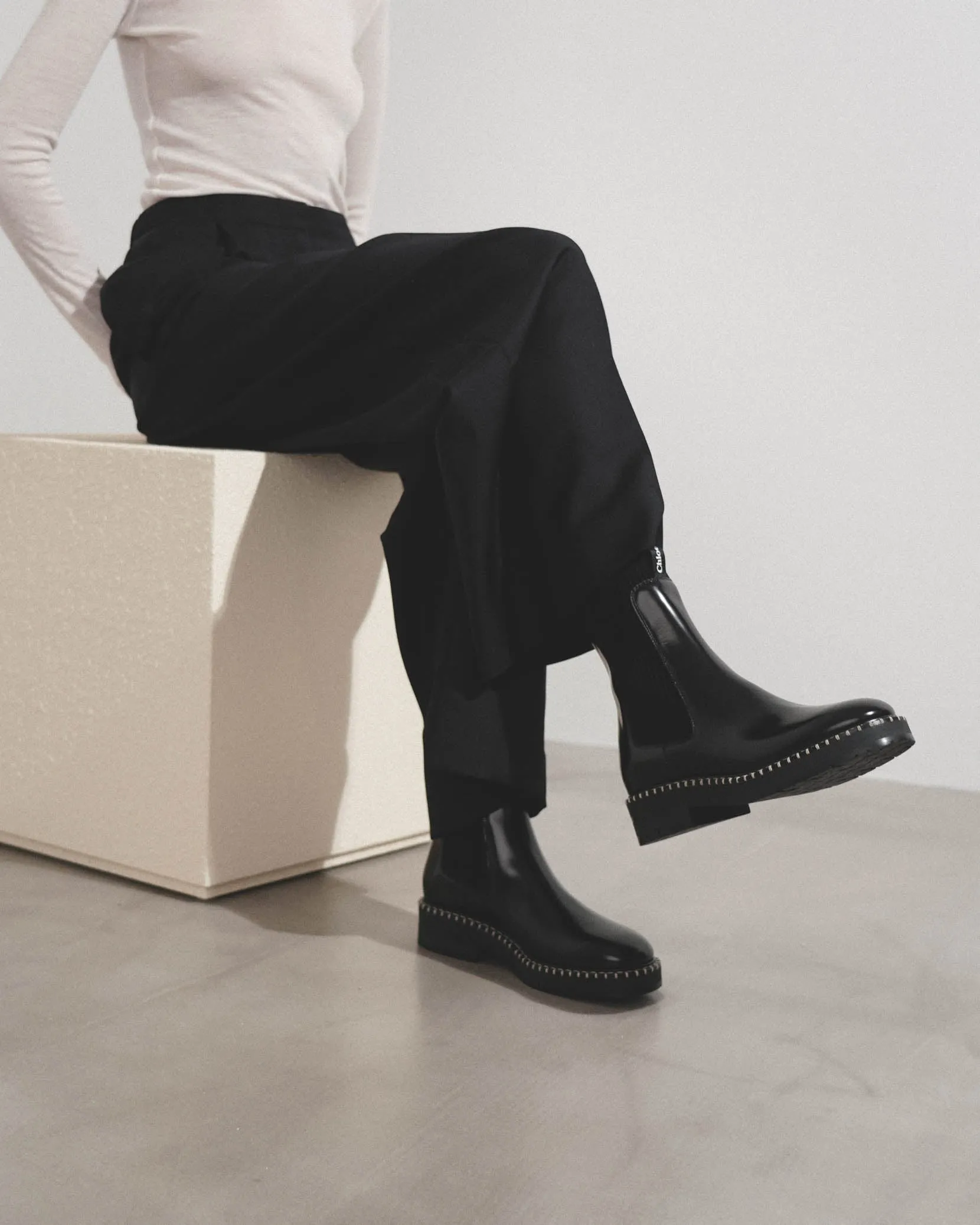 Noua black leather ankle boots